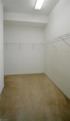 L-shape walk-in master closet