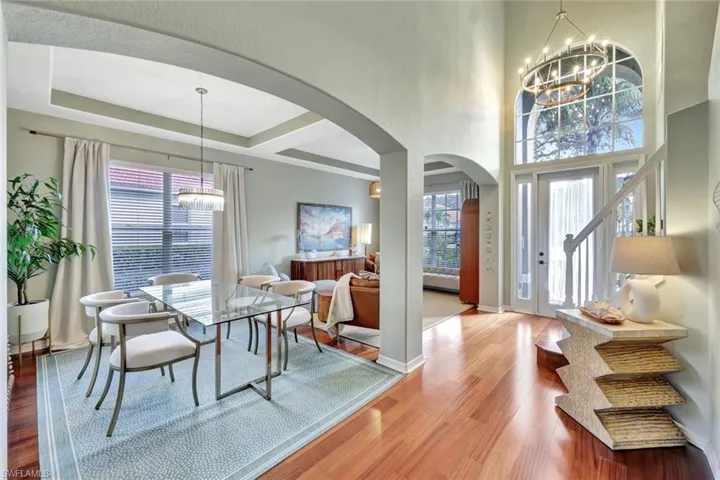 Grand entry with volume ceilings brings you in to your front living & dining space
