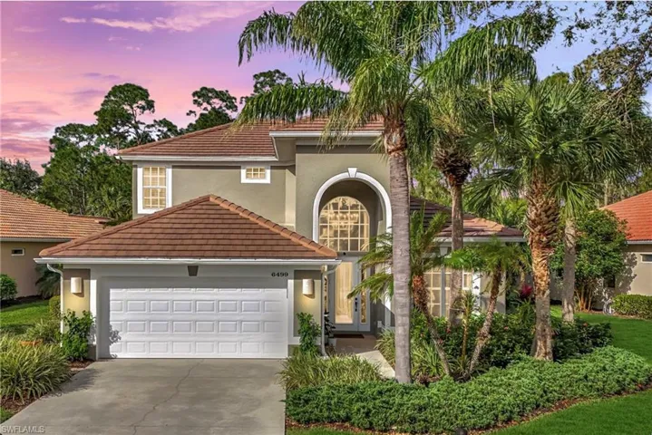 Beautiful landscaping and extended driveway lead into this spacious 2 story home