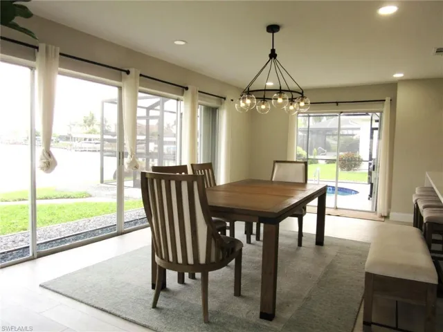 Dining area with a notable chandelier