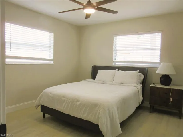 Bedroom featuring light hardwood / wood-style flooring and ceiling fan