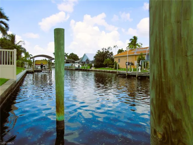 Water view with a dock