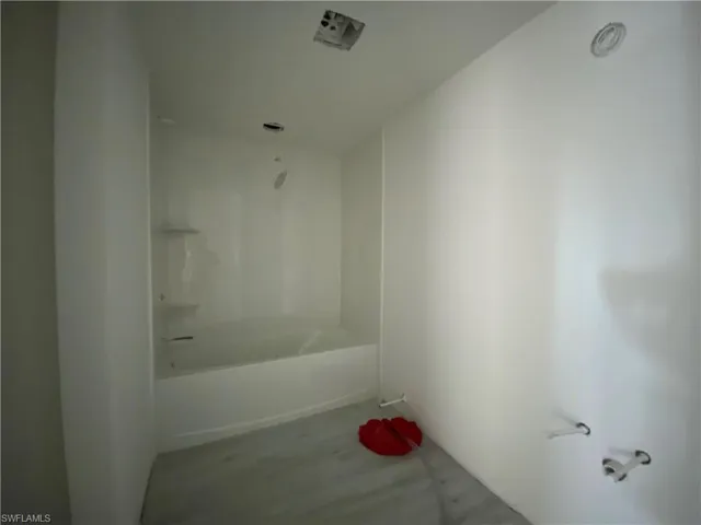 Bathroom featuring shower / bathtub combination