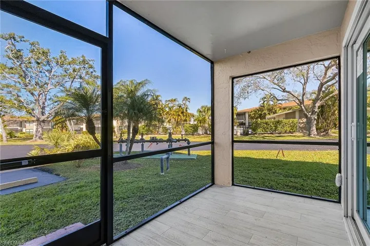 Unfurnished sunroom featuring healthy amount of natural light