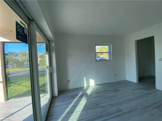 Empty room with wood finished floors