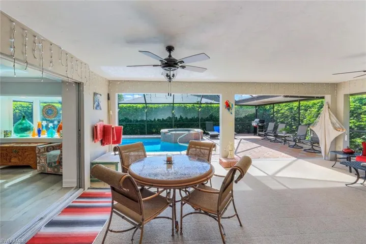 Extra large outdoor living space under roof - the perfect pool party is waiting!