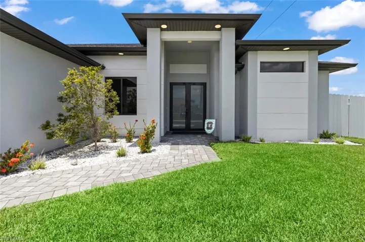Great Curb appeal on this modern masterpiece