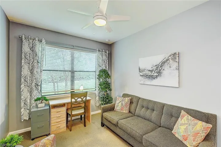 Office space featuring carpet flooring and ceiling fan