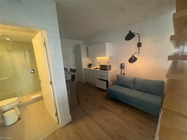 bedroom with a full bathroom