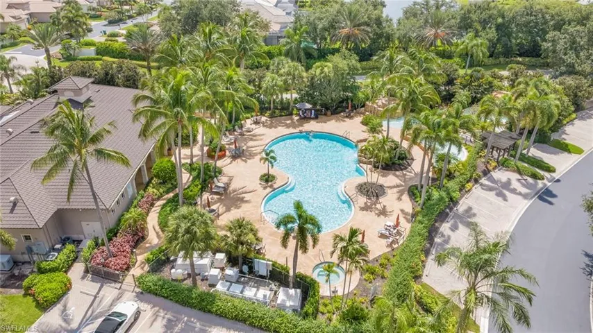 The resort-style community pool serves as the heart of Regency Reserve, offering a tropical retreat complete with sparkling waters, generous lounging areas, and lush palm-lined landscaping. Just moments from your residence, it's the perfect place to unwind, entertain guests, or enjoy Florida's year-round outdoor lifestyle.