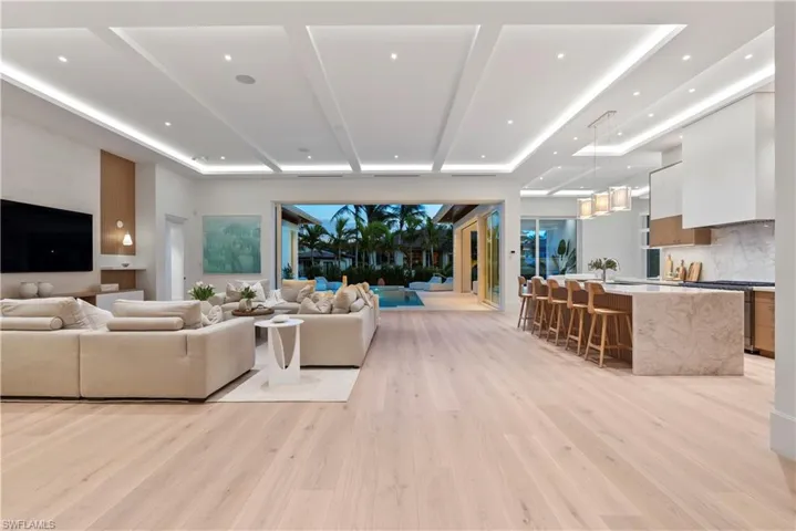 Living room featuring light hardwood / wood-style floors and sink