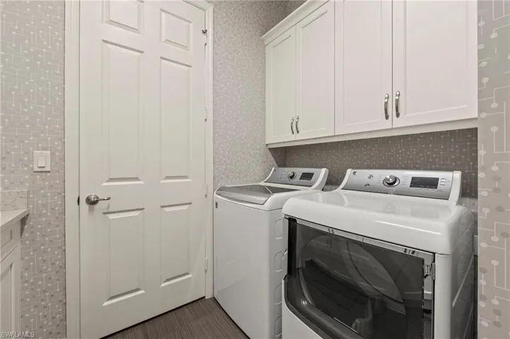 4056 Nova Ln. Naples FL 34119 - Laundry room with gas dryer