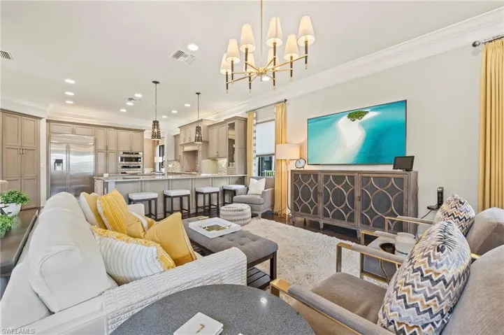4056 Nova Ln. Naples FL 34119 - Casual living area adjacent to open island kitchen