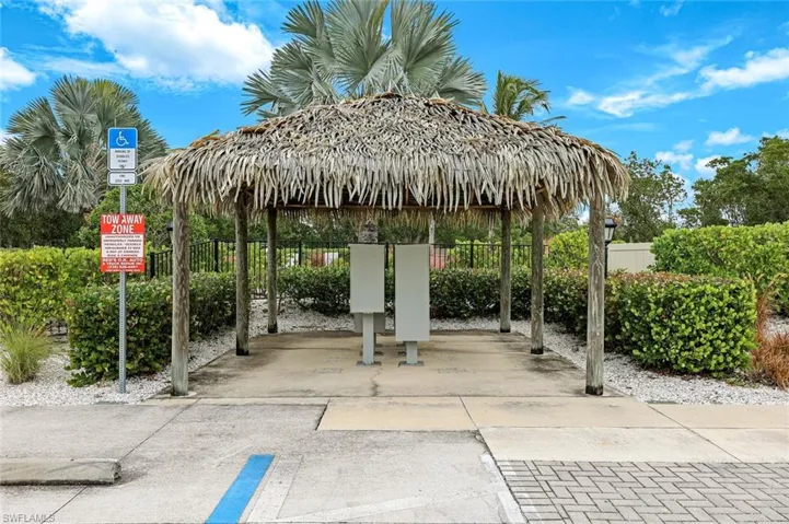 View of parking with mail area