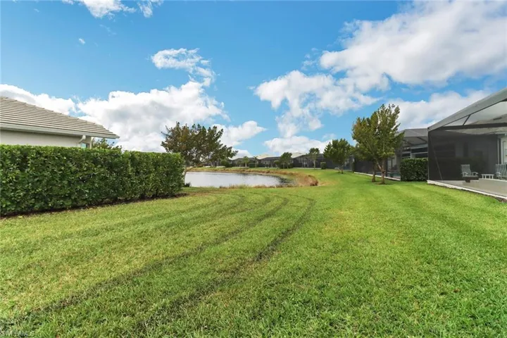 The property line extends well beyond the shrubs.  This is a huge lot!