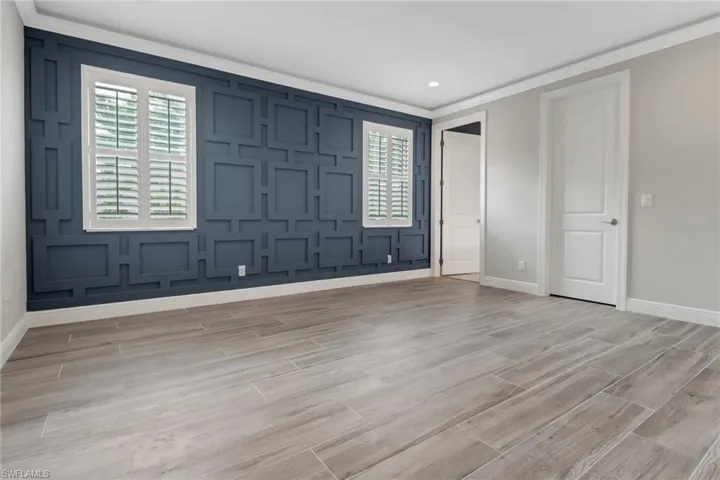 Another guest bedroom with custom millwork