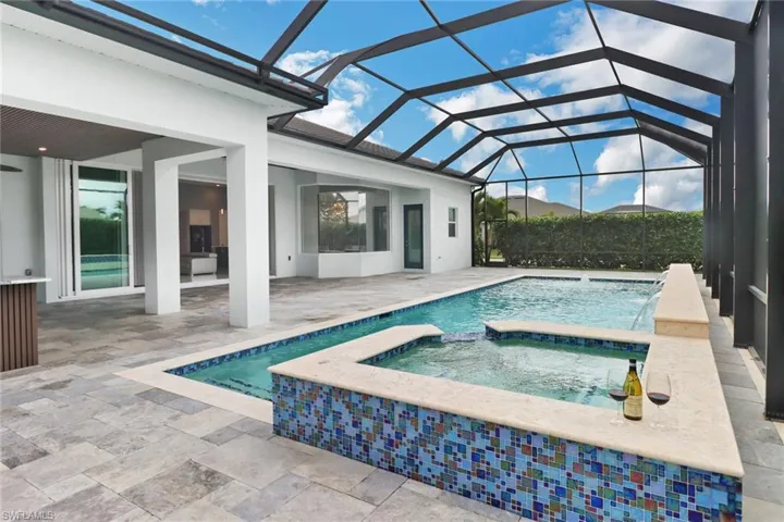 This HUGE 45 foot saltwater pool and spa was added after purchase and custom designed.