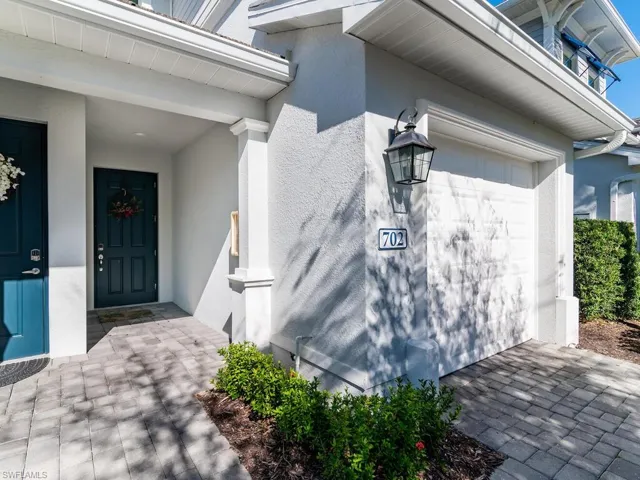 Entrance to property with a garage