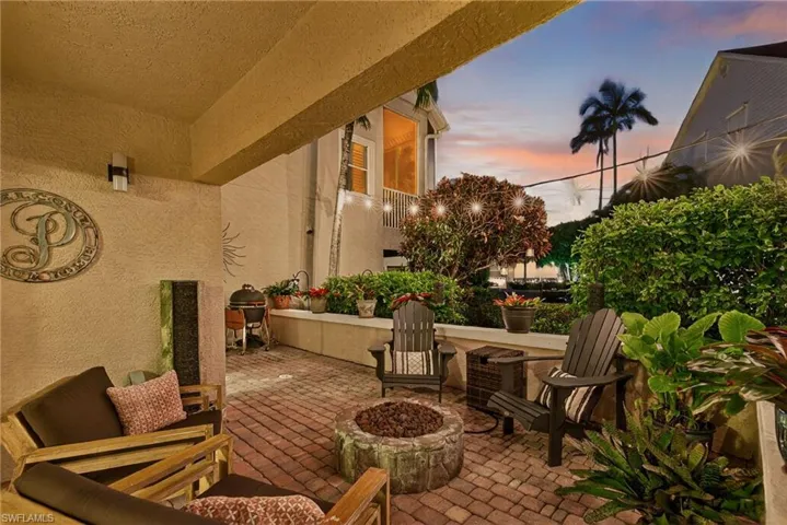View of patio / terrace featuring an outdoor fire pit and grilling area