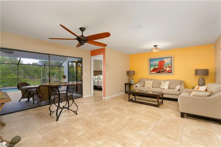 Living room featuring a ceiling fan
