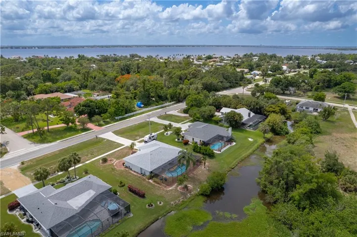 Aerial view of residential area with a nearby body of water