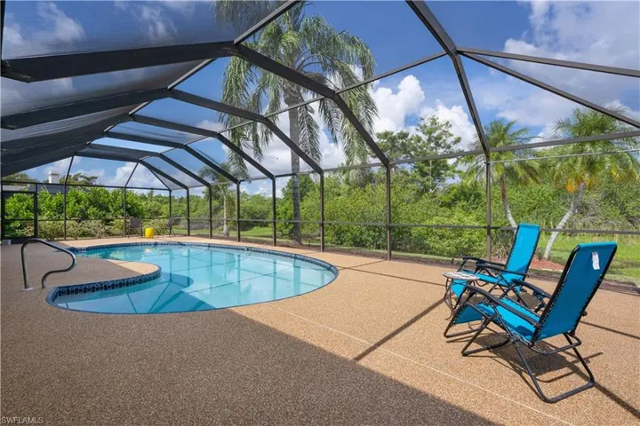 Outdoor pool with a patio area