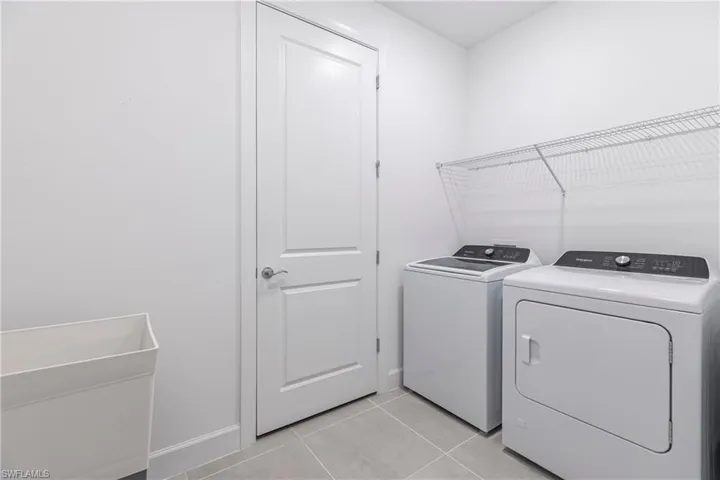 Washer and dryer with utility sink