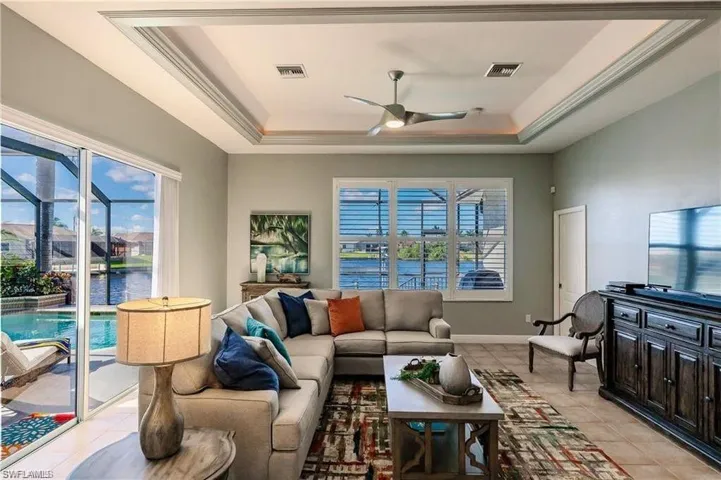 2nd living room area with slider to pool and water views