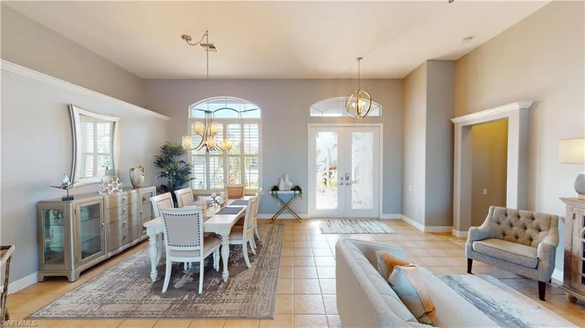 Dining-formal living over looking pool