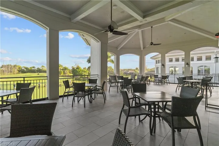 Carpeted dining room featuring coffered ceiling, beam ceiling, plenty of natural light, and recessed lighting