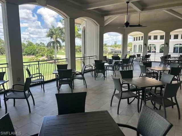View of patio / terrace with outdoor dining area and a ceiling fan