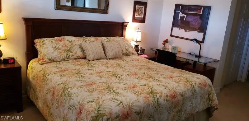 Bedroom with carpet