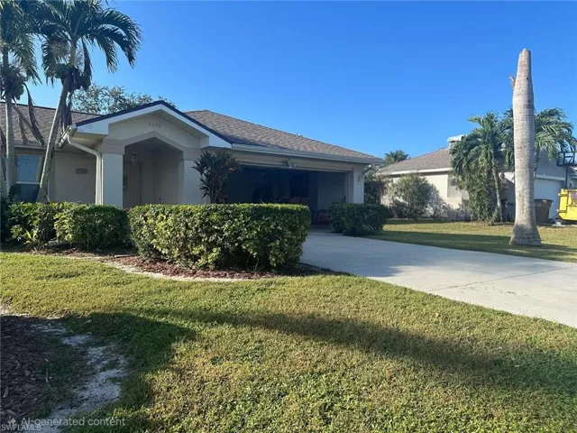 View of front of home with a front yard, stucco siding, driveway, and roof with shingles