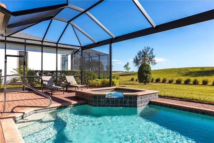 Pool/spa combo and view of the 9'th fairway