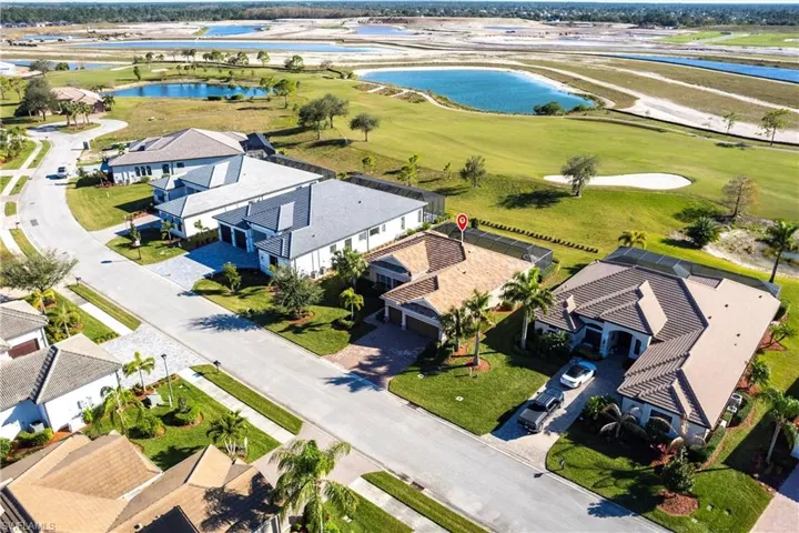Drone / aerial view of the home and 9'th fairway