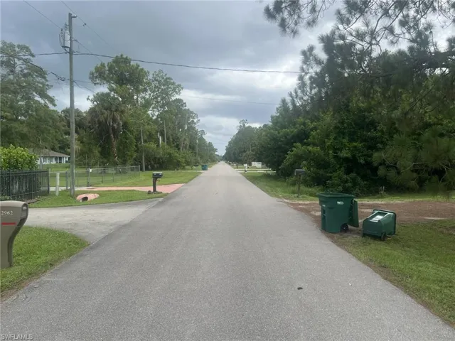 View of street looking west towards dead end area of 6th Ave. SE