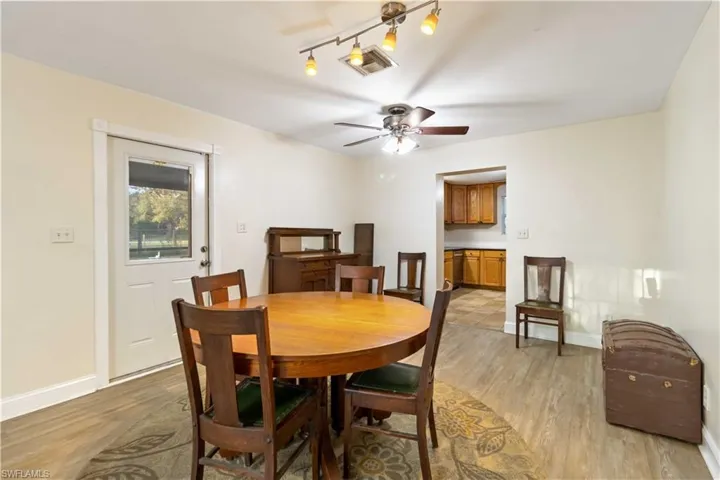 Dining area featuring ceiling fan and light hardwood / wood-style floors