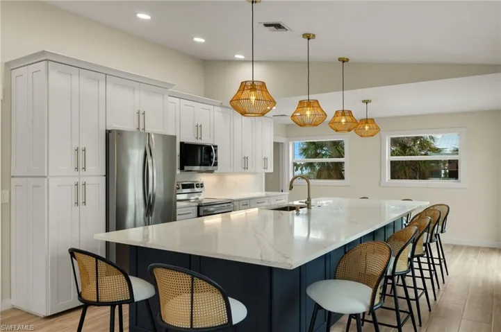 Gourmet kitchen with ample counter space and storage - Virtually Edited Image
