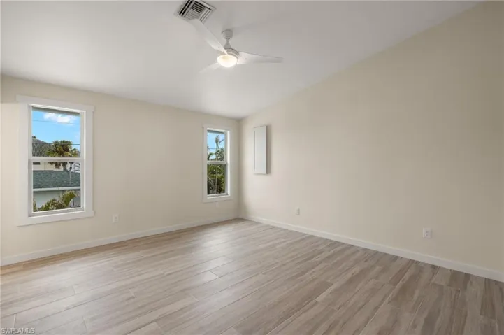 Bedroom space with ample natural light - Virtually Edited Image