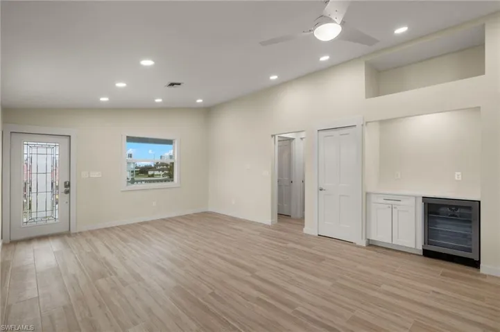 Inviting open floor plan with ample natural light - Virtually Edited Image