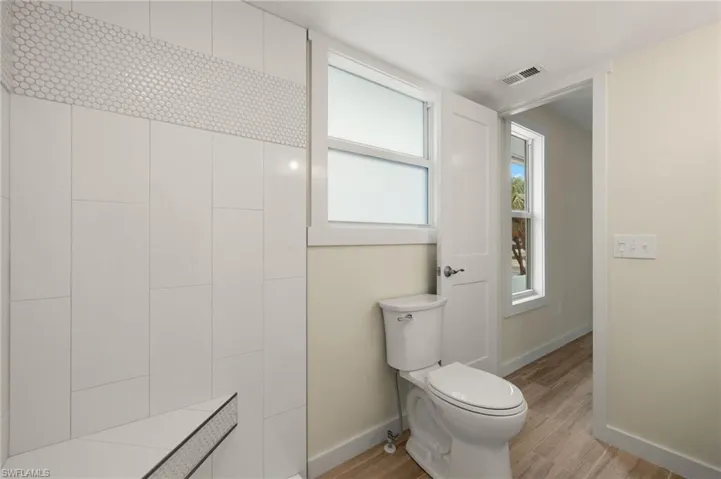 Well-appointed bathroom with modern fixtures - Virtually Edited Image