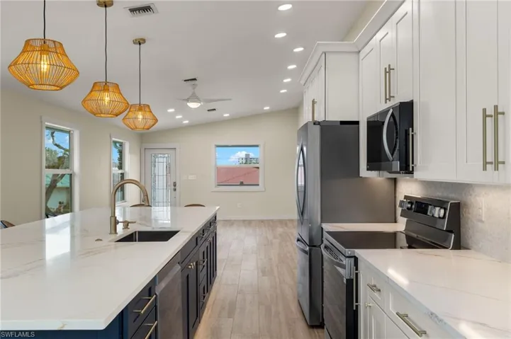 Functional kitchen with high-quality stainless steel appliances - Virtually Edited Image