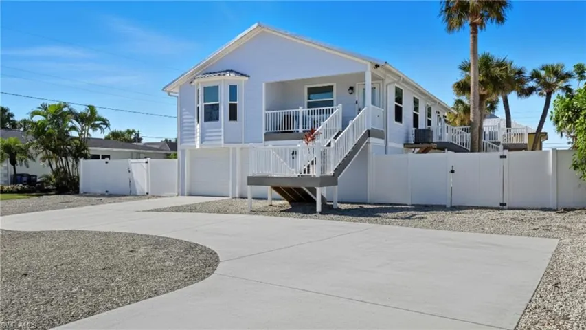 Charming elevated beach home with a coastal vibe - Virtually Edited Image