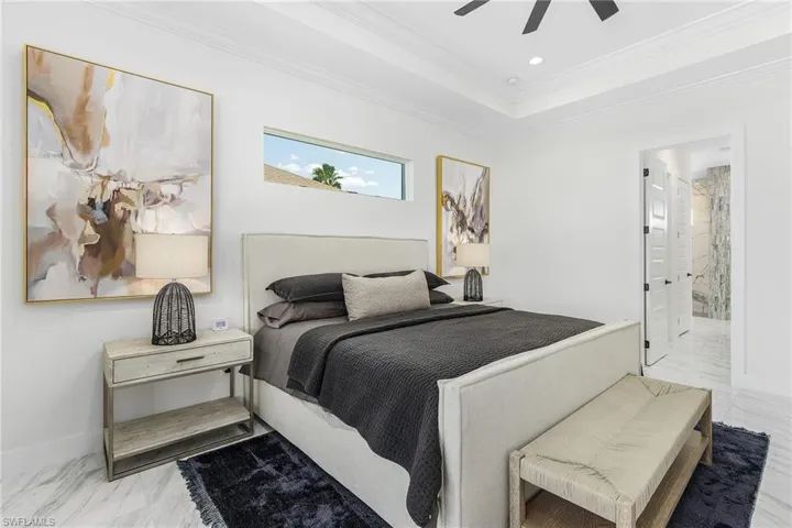 Bedroom with crown molding, baseboards, recessed lighting, ceiling fan, and connected bathroom