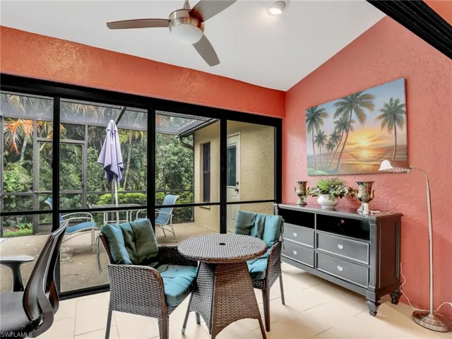 Sunroom with a ceiling fan