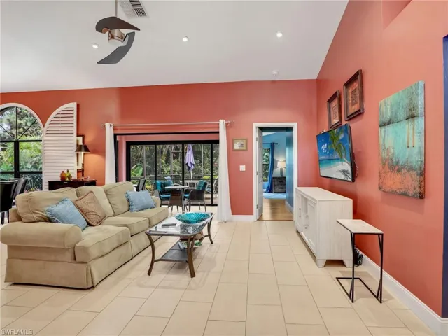 Living area featuring a healthy amount of sunlight, baseboards, recessed lighting, and visible vents