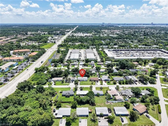Aerial perspective showcasing a residential property within a broader community