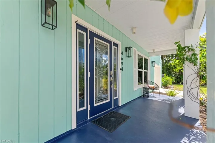 View of exterior entry featuring a porch