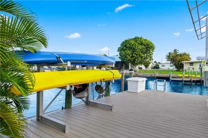 Enjoy direct canal access from your private dock, complete with a kayak for endless paddling, fishing, or waterside relaxation.