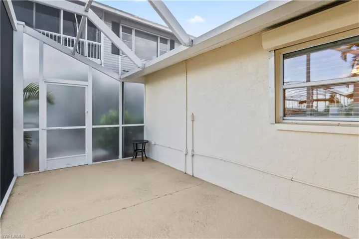Quiet, screened patio offers a comfortable spot to enjoy morning coffee, sunsets, or peaceful waterfront views.